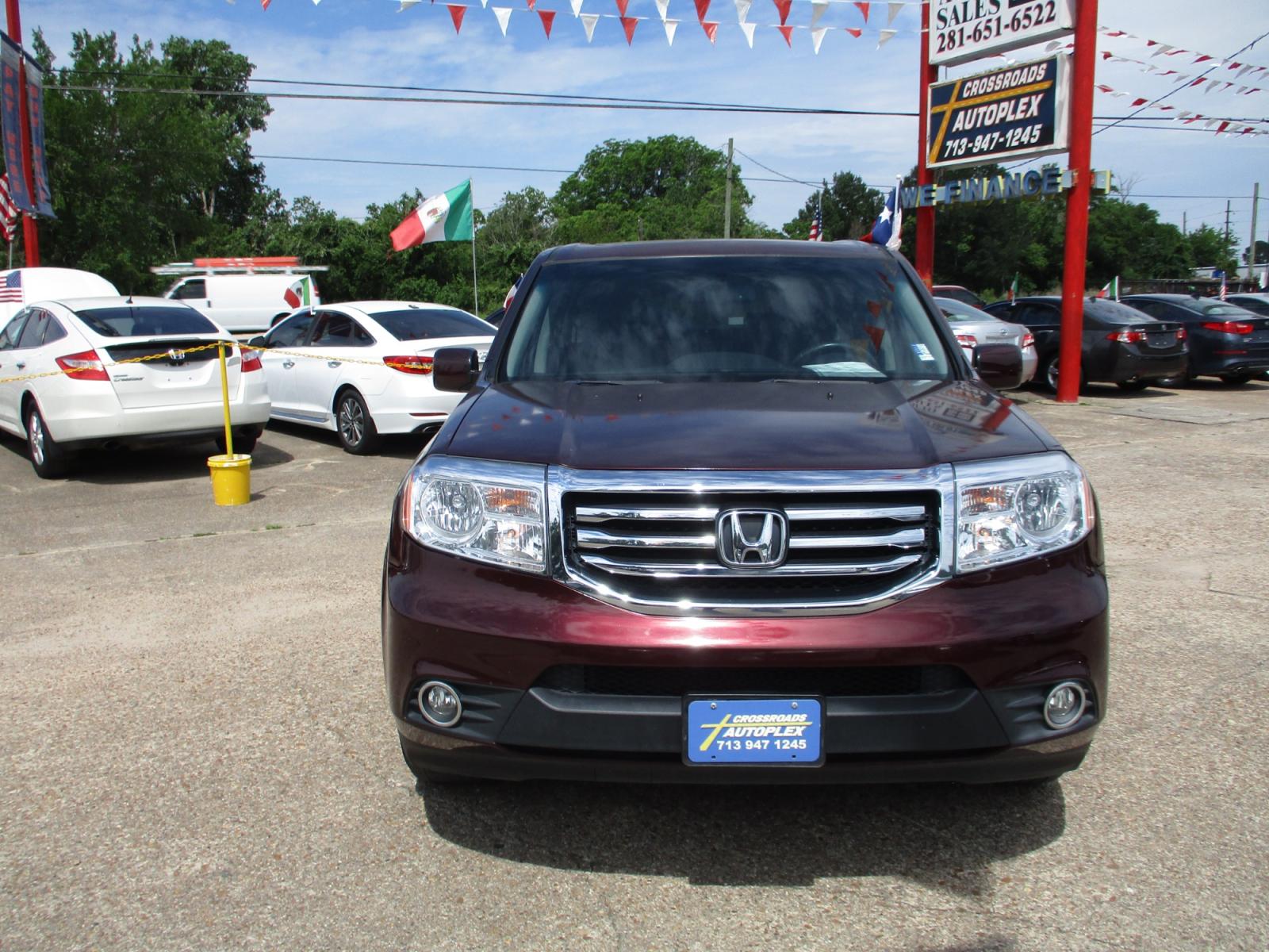 2012 MAROON HONDA PILOT EX-L 2WD 5-Spd AT (5FNYF3H5XCB) with an 3.5L V6 SOHC 24V engine, 5-SPEED AUTOMATIC transmission, located at 19224 Kuykendahl Rd, Spring, TX, 77379, (713) 947-1245, 30.049259, -95.491402 - Photo #7