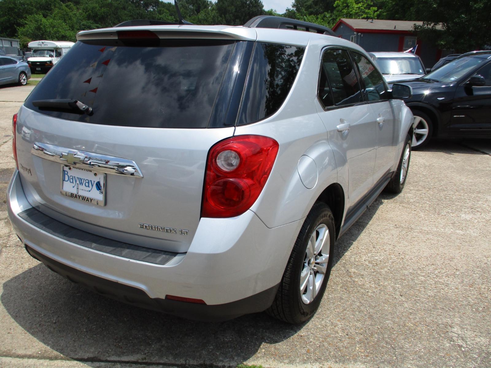 2011 SILVER CHEVROLET EQUINOX 1LT 2WD (2CNALDEC7B6) with an 2.4L L4 DOHC 16V engine, 6-SPEED AUTOMATIC transmission, located at 19224 Kuykendahl Rd, Spring, TX, 77379, (713) 947-1245, 30.049259, -95.491402 - Photo #2
