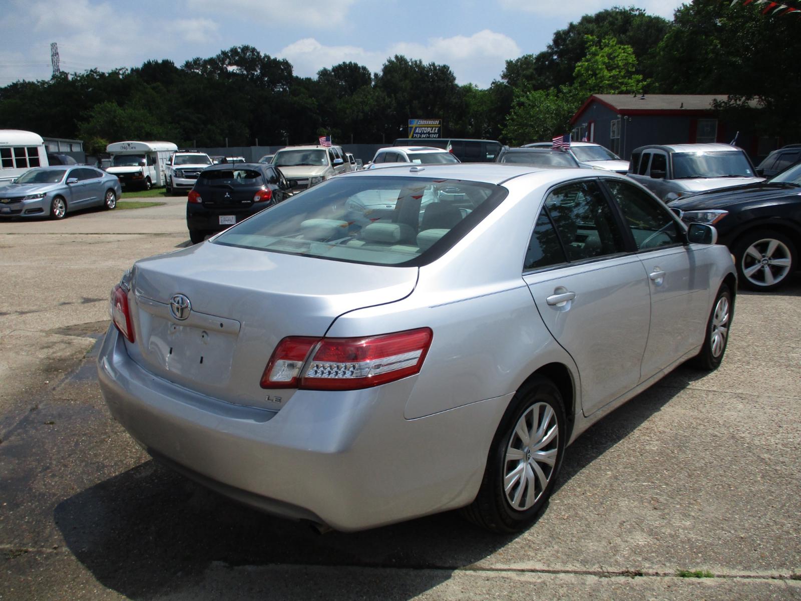 2010 SILVER TOYOTA CAMRY LE 6-Spd AT (4T1BF3EK3AU) with an 2.5L L4 DOHC 16V engine, 6-SPEED AUTOMATIC transmission, located at 19224 Kuykendahl Rd, Spring, TX, 77379, (713) 947-1245, 30.049259, -95.491402 - Photo #2