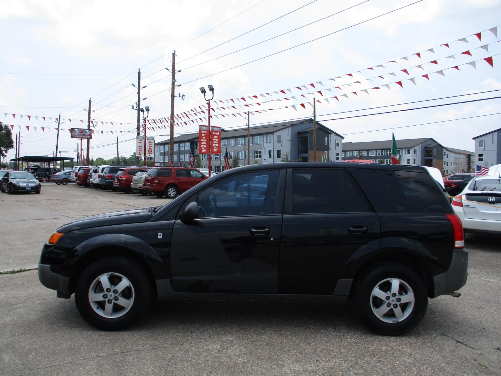 2005 BLACK SATURN VUE FWD (5GZCZ33D85S) with an 2.2L L4 DOHC 16V engine, 4-SPEED AUTOMATIC OR 5-SPEED MANUAL transmission, located at 19224 Kuykendahl Rd, Spring, TX, 77379, (713) 947-1245, 30.049259, -95.491402 - Photo #5