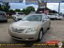 2007 GOLD /TAN TOYOTA CAMRY CE 5-Spd AT (4T1BE46K37U) with an 2.4L L4 DOHC 16V engine, 5-SPEED AUTOMATIC transmission, located at 19224 Kuykendahl Rd, Spring, TX, 77379, (713) 947-1245, 30.049259, -95.491402 - Photo#0