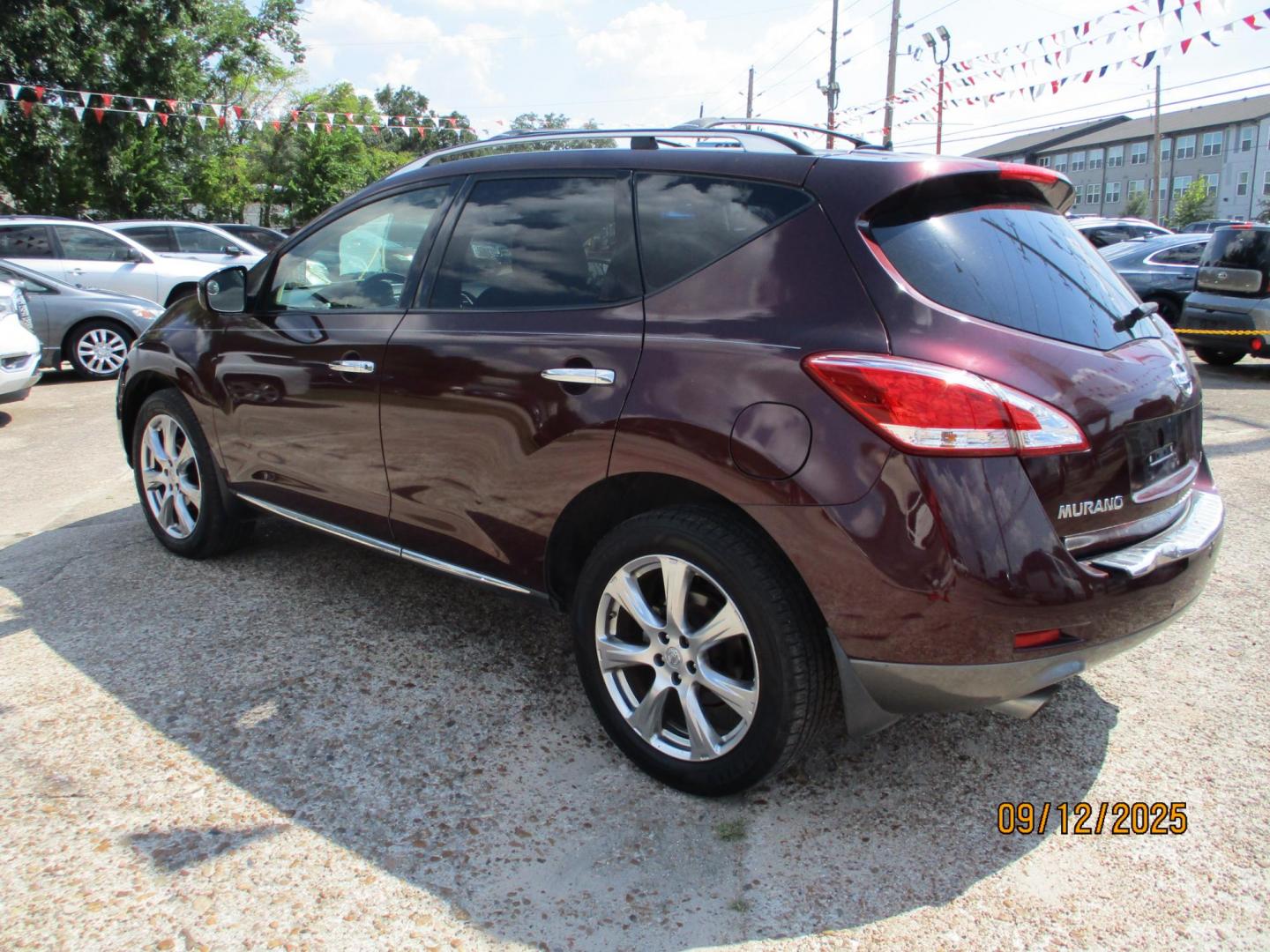 2013 MAROON /TAN NISSAN MURANO SV (JN8AZ1MU4DW) with an 3.5L V6 DOHC 24V engine, CVT transmission, located at 19224 Kuykendahl Rd, Spring, TX, 77379, (713) 947-1245, 30.049259, -95.491402 - Photo#2